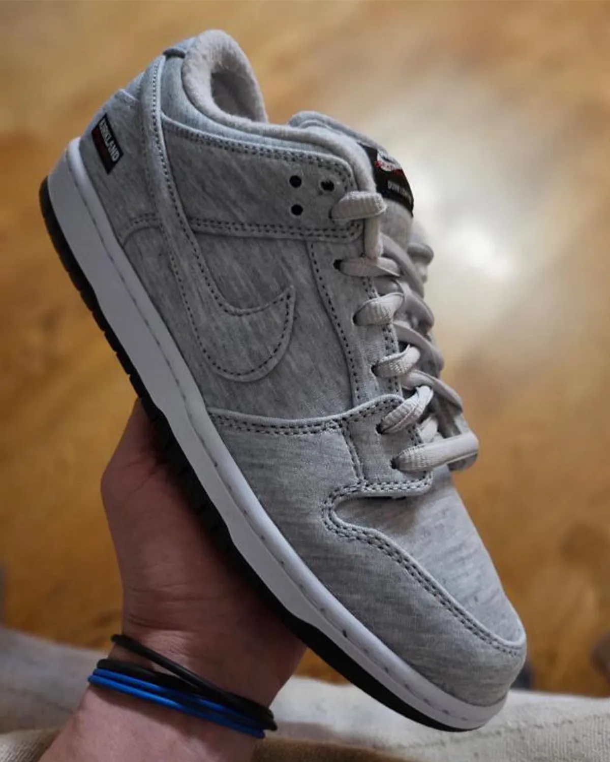 Kirkland Signature x Nike SB Dunk Low in hand