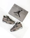 Air Jordan 4 "Cave Stone" side view on foot