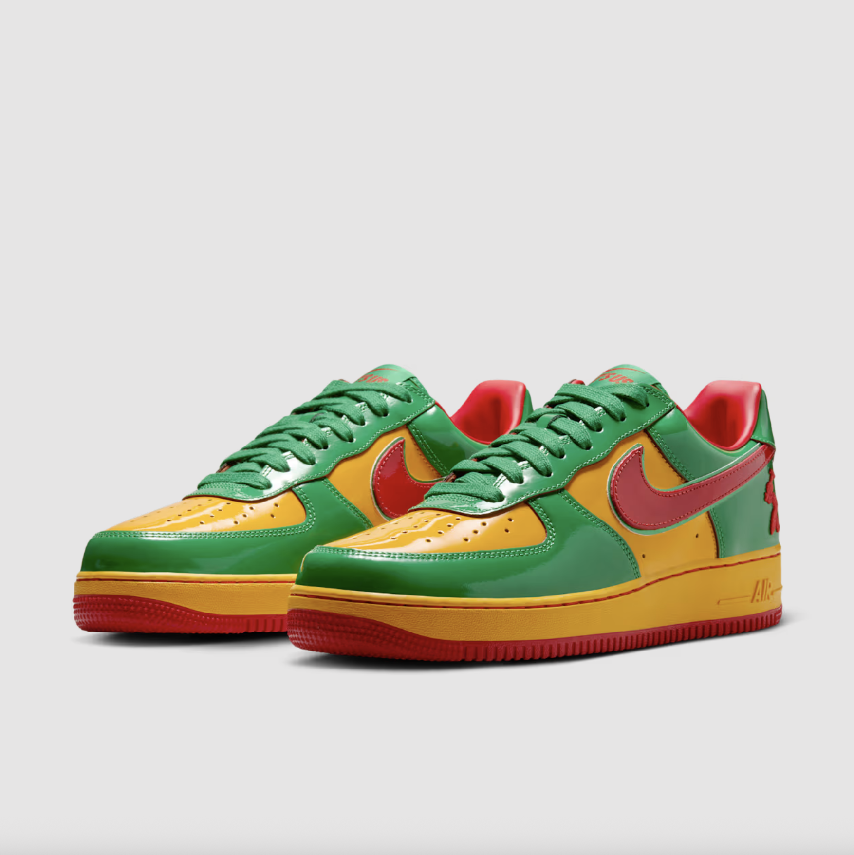 Official images of the vibrant red, green, and yellow Nike Air Force 1 “Lucky Green” by Lil Yachty.
