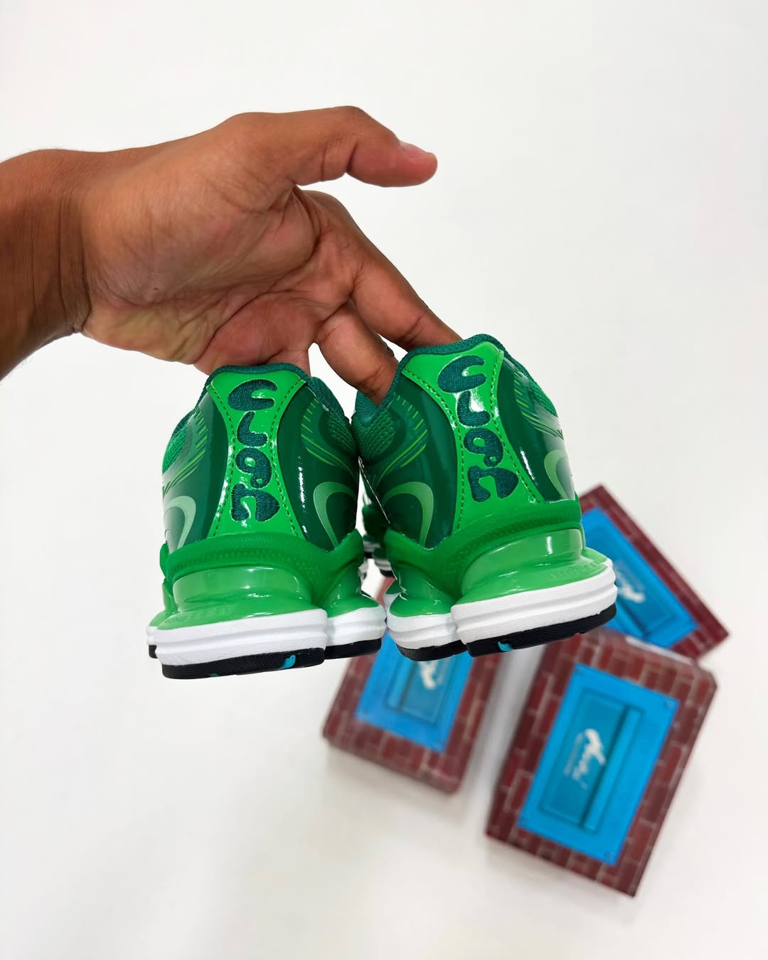 Amine x New Balance 2000 Biblioteca sneaker side view in green