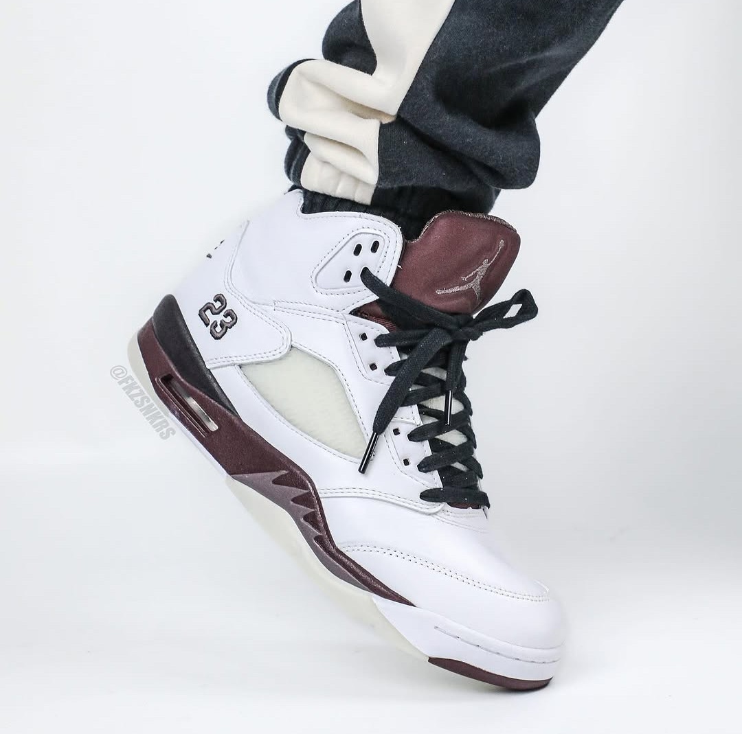 Side angle showcasing the burgundy midsole on the A Ma Maniére Air Jordan 5 Violet Ore