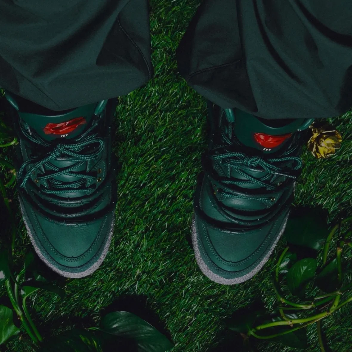 Alternate angle of the vibrant red, green, and yellow Nike Air Force 1 “Lucky Green” by Lil Yachty.