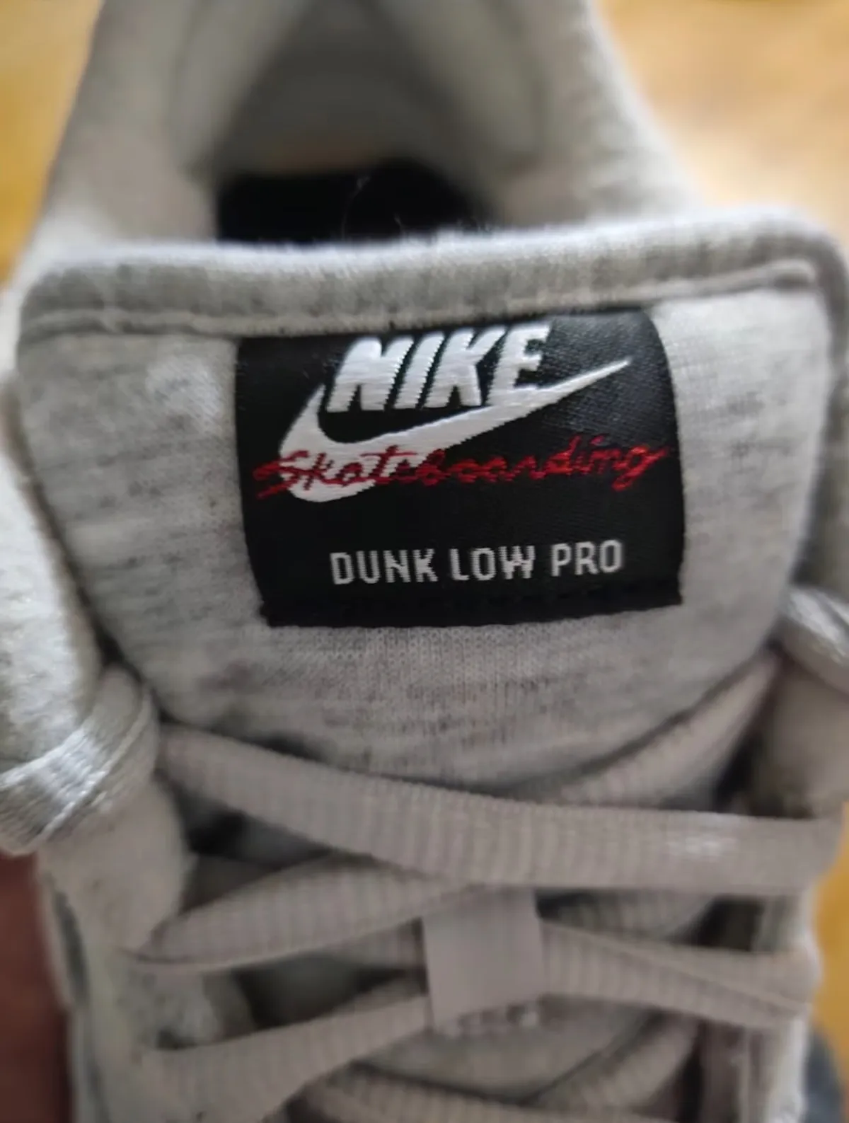 Kirkland Signature x Nike SB Dunk Low in hand