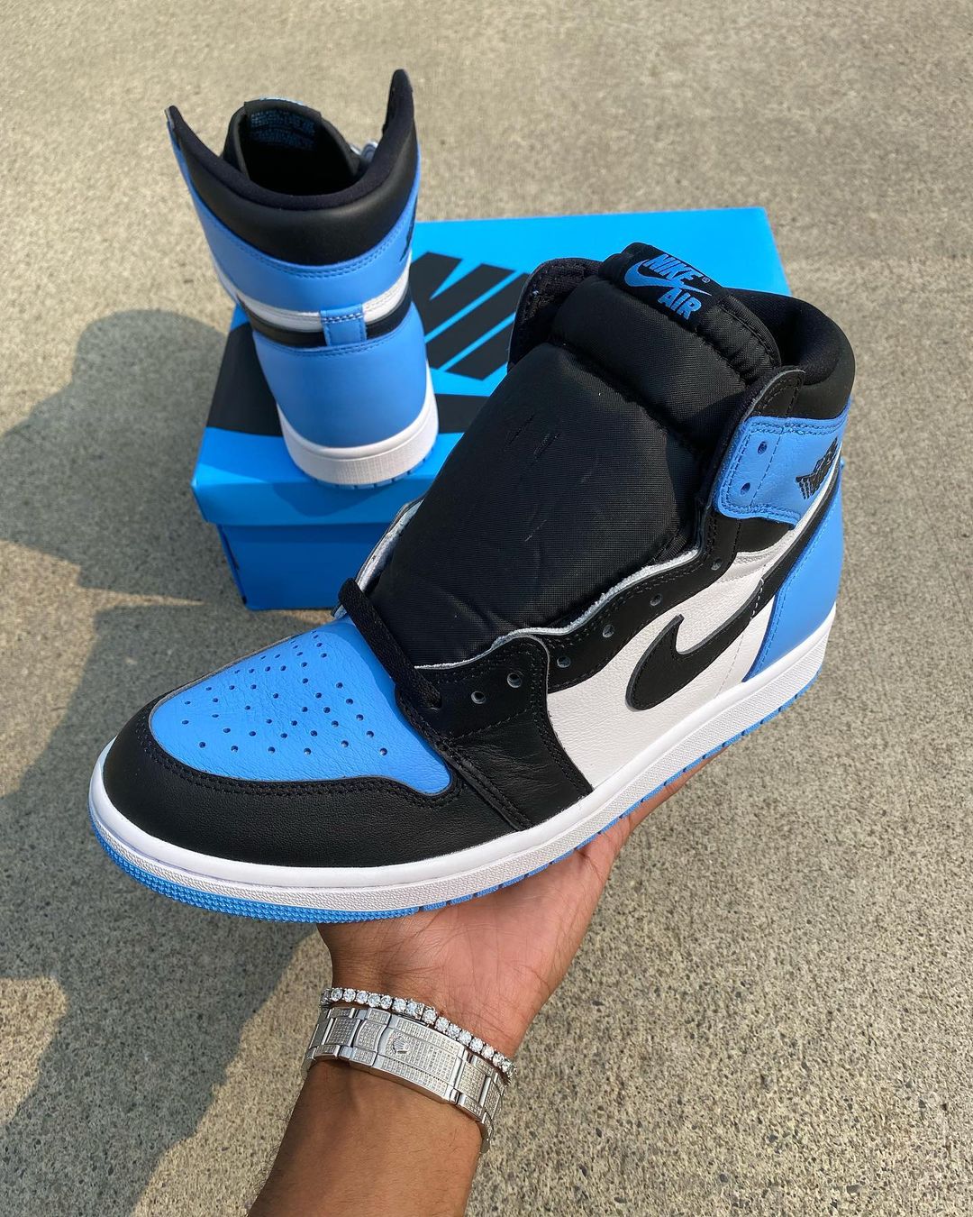 jordan 1 university blue in hand