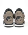Air Jordan 4 "Cave Stone" side view on foot