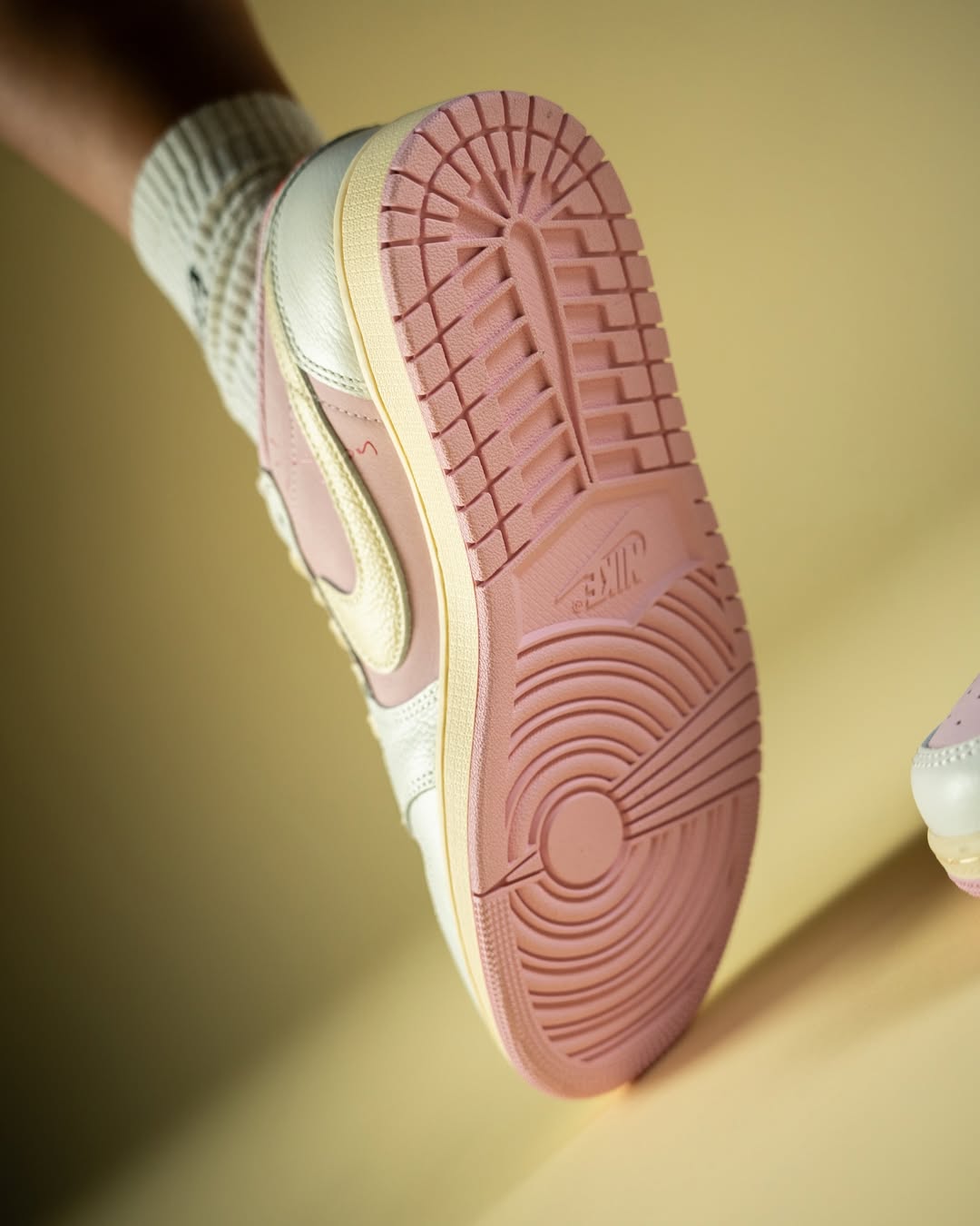 Travis Scott x Air Jordan 1 Low "Shy Pink" Close-up of the Air Jordan 1 Low OG “Shy Pink” on Travis Scott’s feet