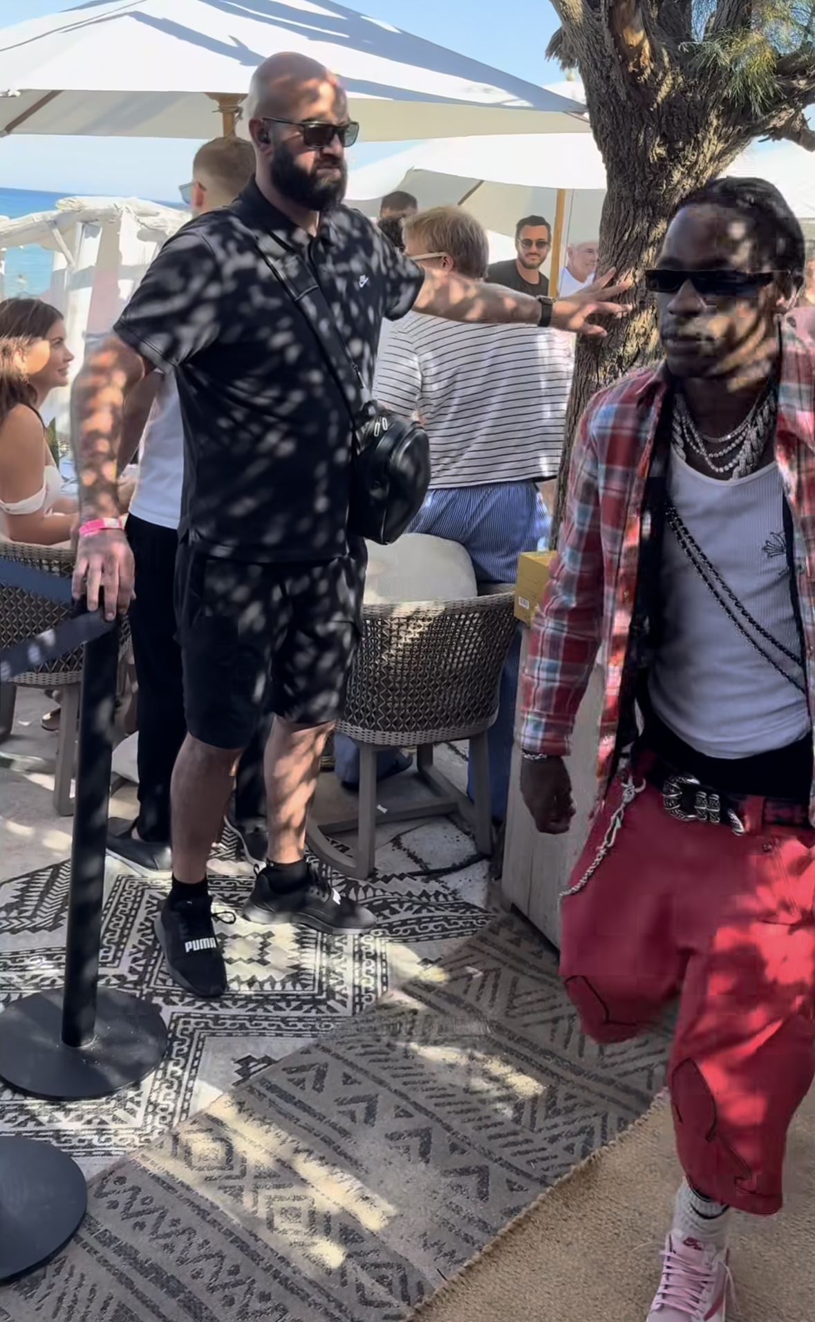 Travis Scott x Air Jordan 1 Low "Shy Pink" Travis Scott wearing the Air Jordan 1 Low OG “Shy Pink” at the beach