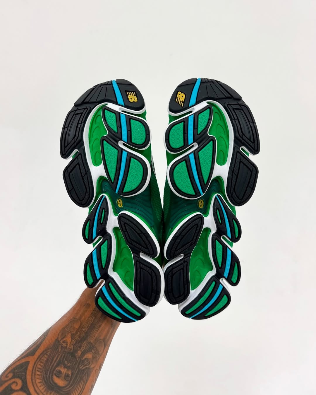 Amine x New Balance 2000 Biblioteca sneaker side view in green