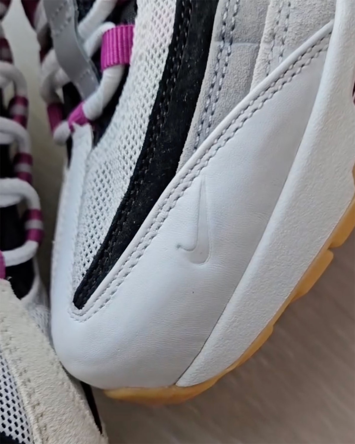 Close-up of mini Swoosh on Nike SB Air Max 95 Cactus Flower toe box