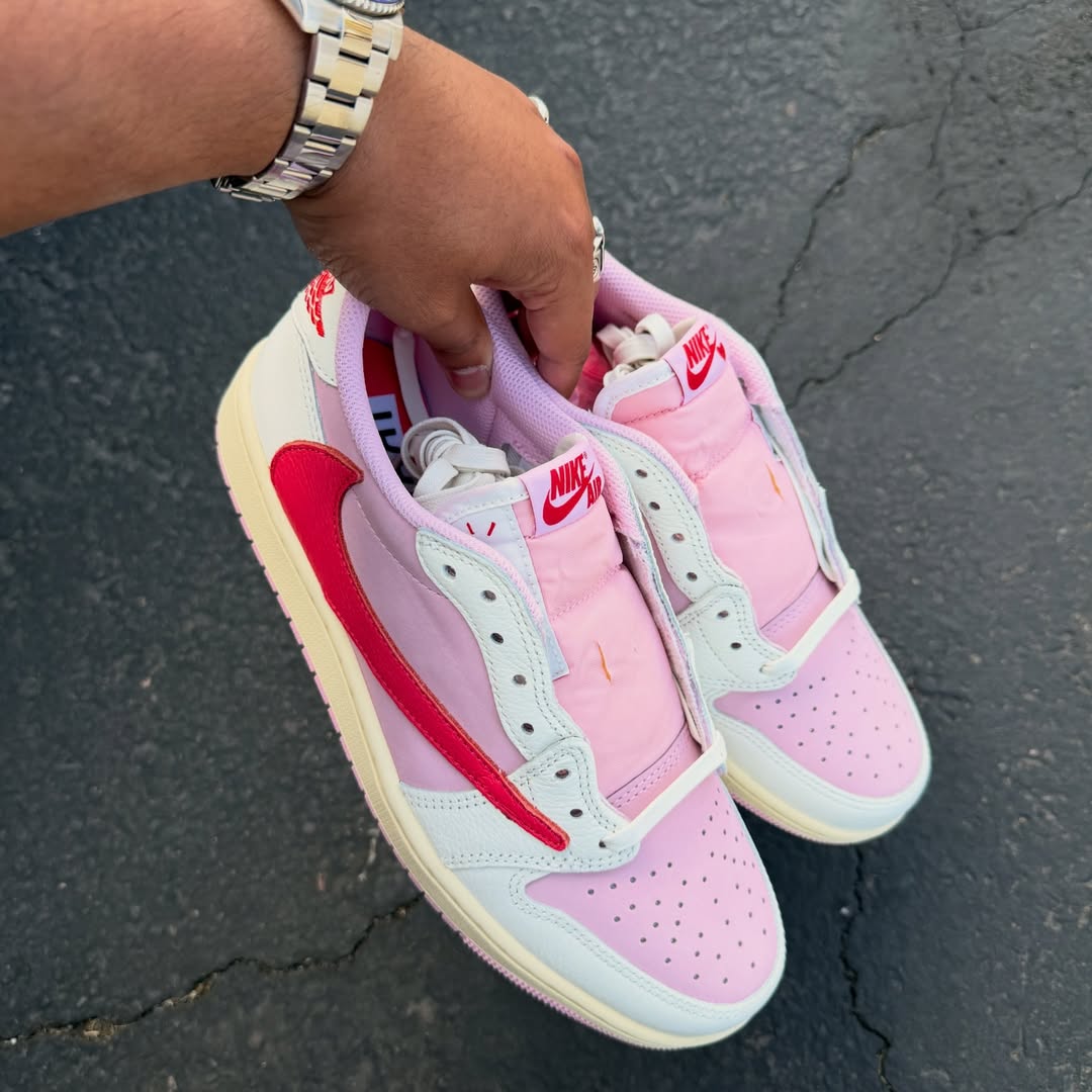 Travis Scott x Air Jordan 1 Low "Tropical Pink" in hand