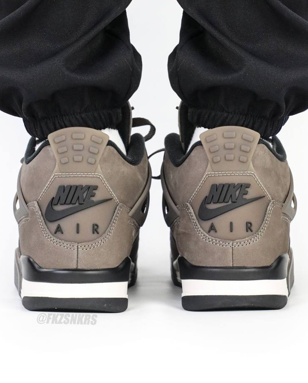 Air Jordan 4 Cave Stone Heel shot of the Air Jordan 4 Cave Stone with Nike Air branding and suede finish