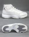 Top-down view of the Air Jordan 11 “Grand Finale” showing mesh tongue and lacing system