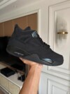 Air Jordan 4 Black Cat in-hand look