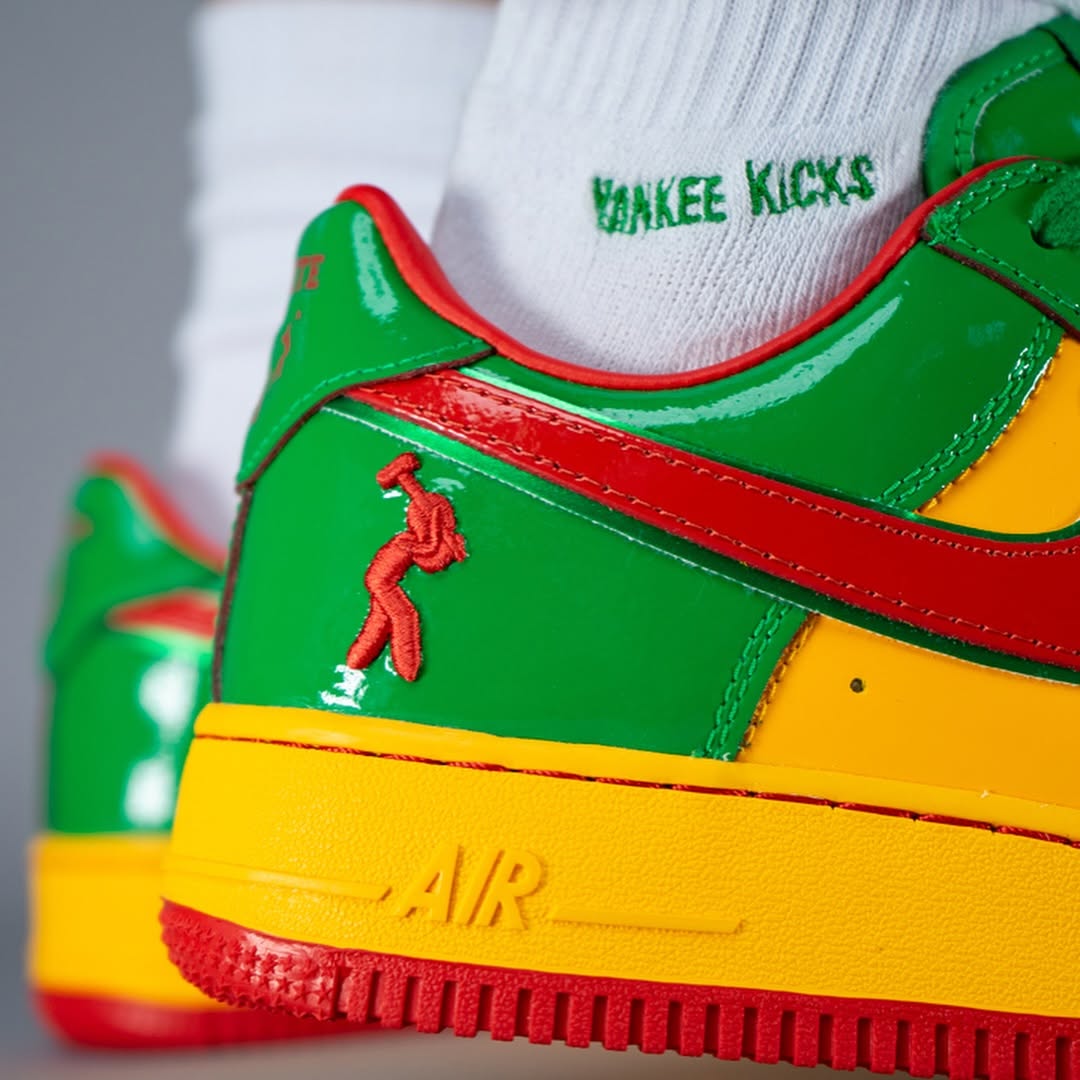 Alternate angle of the vibrant red, green, and yellow Nike Air Force 1 “Lucky Green” by Lil Yachty.