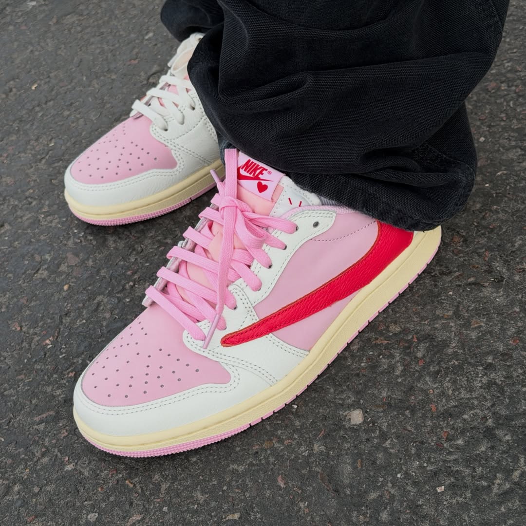 Travis Scott x Air Jordan 1 Low "Tropical Pink" in hand