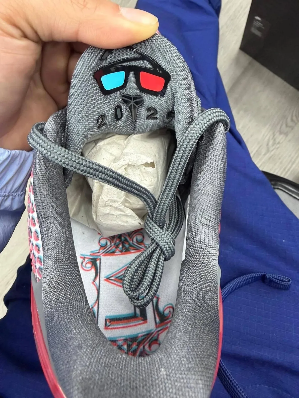 Nike Kobe 6 Protro 3D Hollywood 2026 sneaker with 3D lenticular upper and red/blue mismatched Swooshes