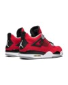 Rear shot of the Air Jordan 4 “Toro Bravo” with black heel tab and white Jumpman branding