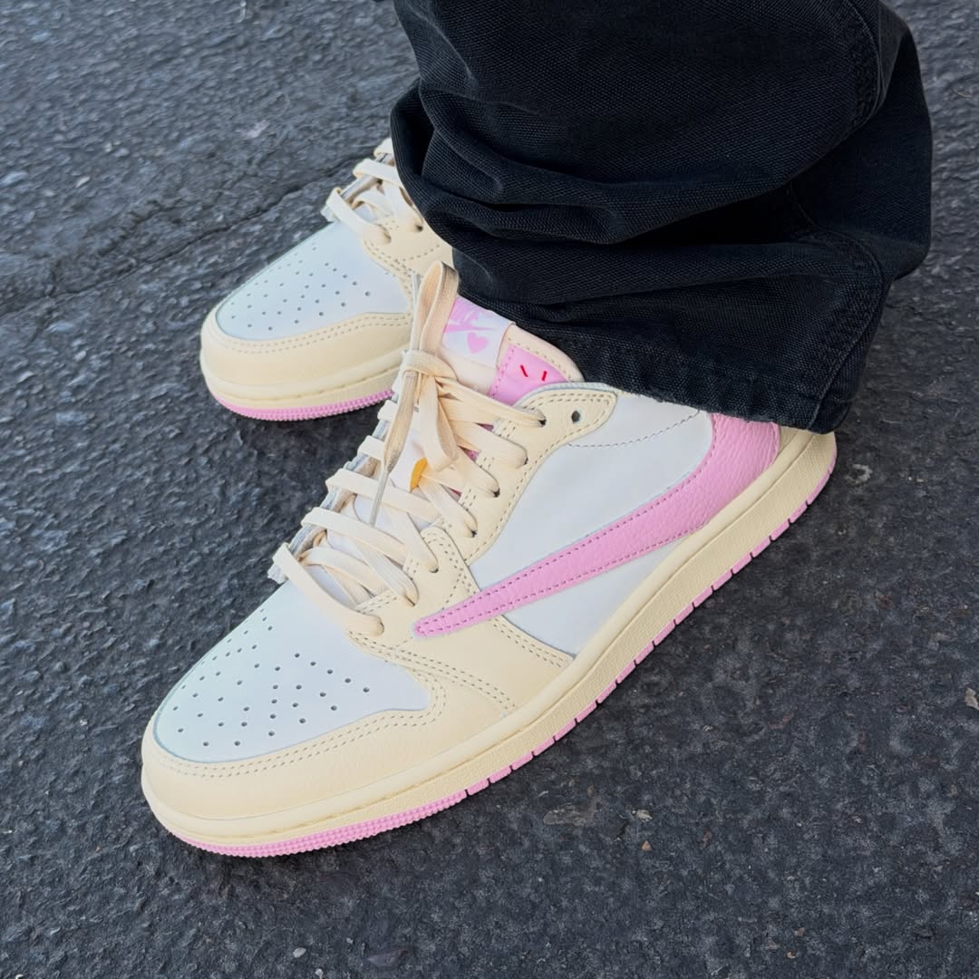 Close-up of the Air Jordan 1 Low OG “Shy Pink” in hand