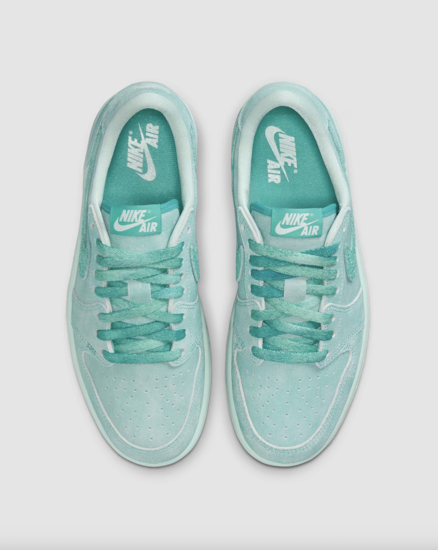 Top view of Air Jordan 1 Low “Washed Teal” W showing tongue and laces