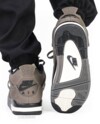 Sole view of the Air Jordan 4 Cave Stone featuring black and white traction pattern