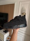 Air Jordan 4 Black Cat in-hand look
