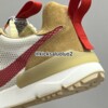 Heel view of the Tom Sachs x Nike Mars Yard 3.0 with red pull tab and mesh upper.