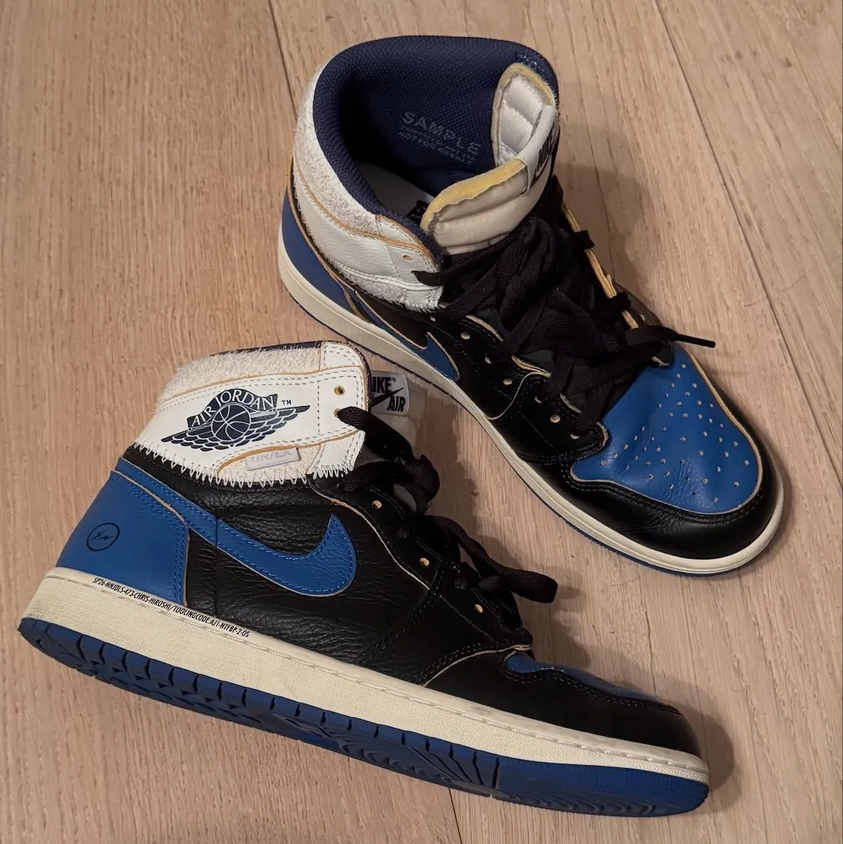 Fragment x Union LA x Air Jordan 1 High “Sport Royal” Close-up of the Fragment x Union x Air Jordan 1 High “Sport Royal” with blue overlays and visible Nike Air branding.