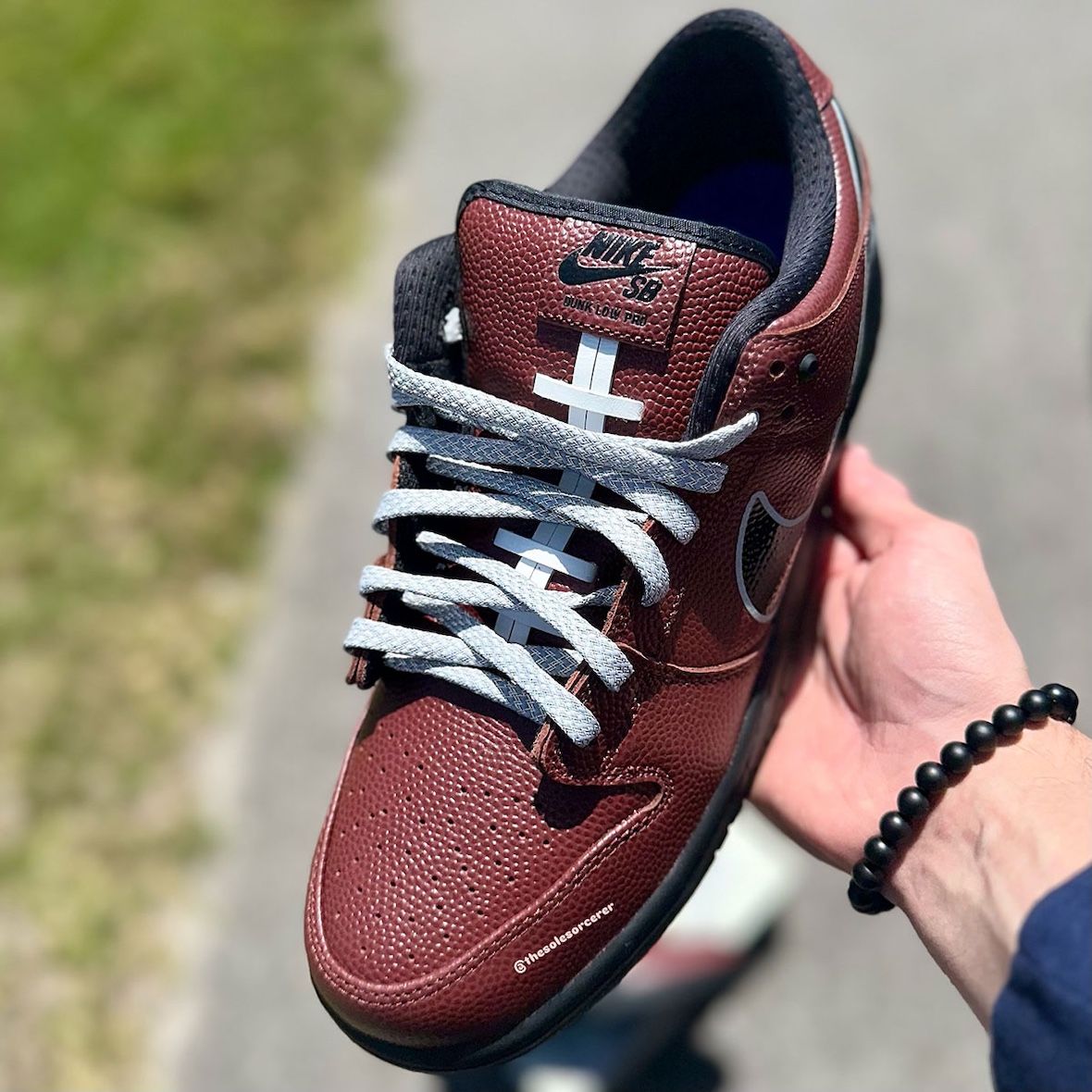 Limosine Skateboards x Nike SB Dunk Low in hand look