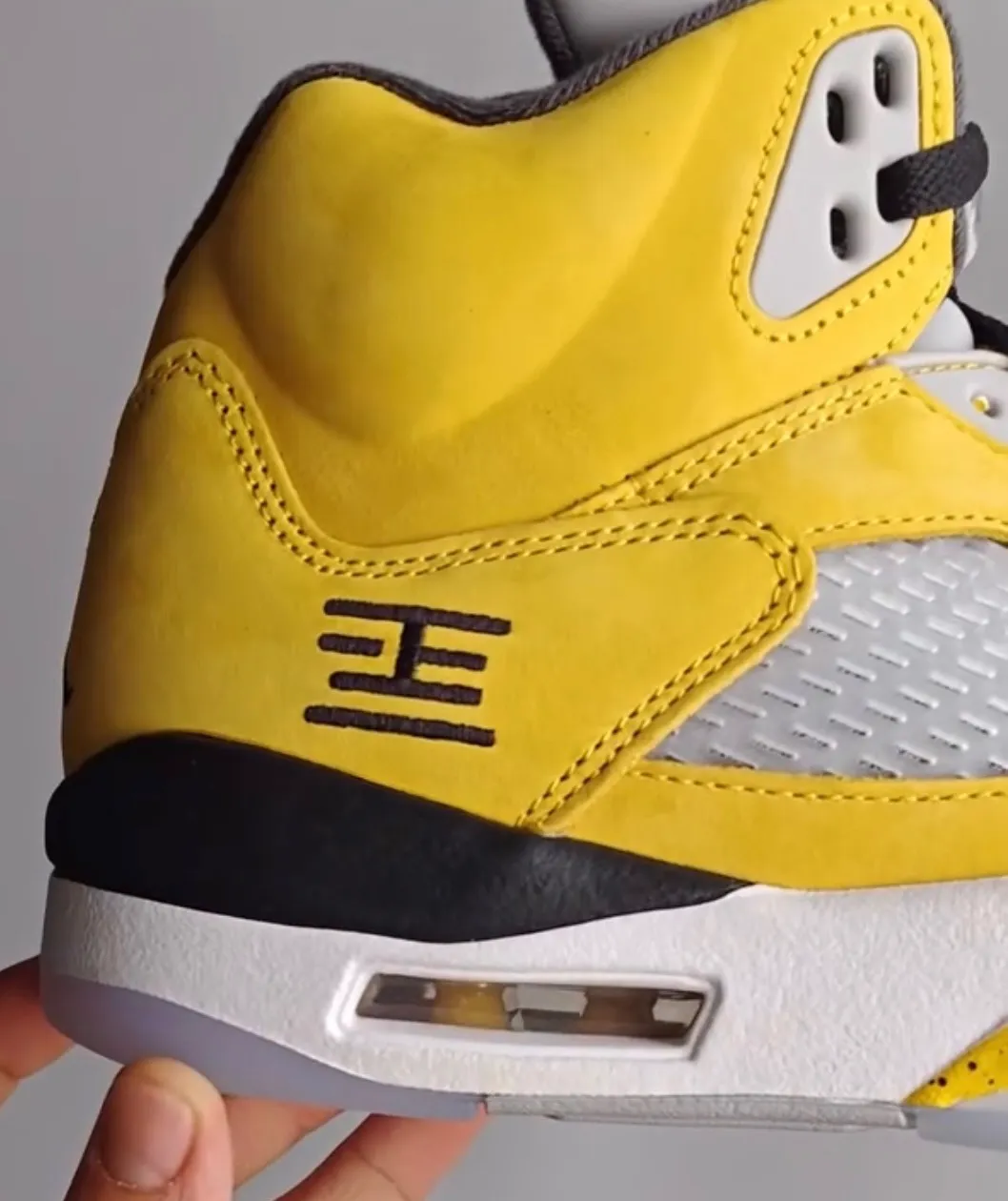 Close-up of the Tokyo 23 embroidery on the Air Jordan 5 “Tokyo”