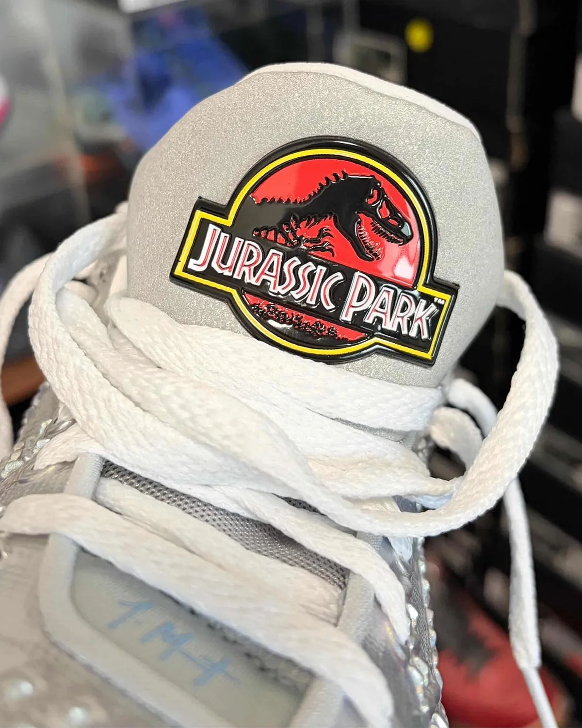 Jurassic Park Nike Ja 3 Metallic Silver in hand images