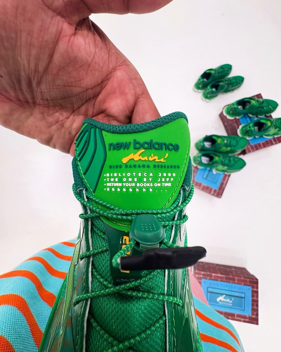 Amine x New Balance 2000 Biblioteca sneaker side view in green