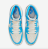 Top-down look at the Air Jordan 1 High "UNC Reimagined" showing the lacing system and Nike Air branding on the tongue.