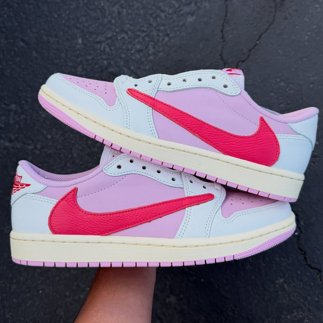 Travis Scott x Air Jordan 1 Low "Tropical Pink" in hand