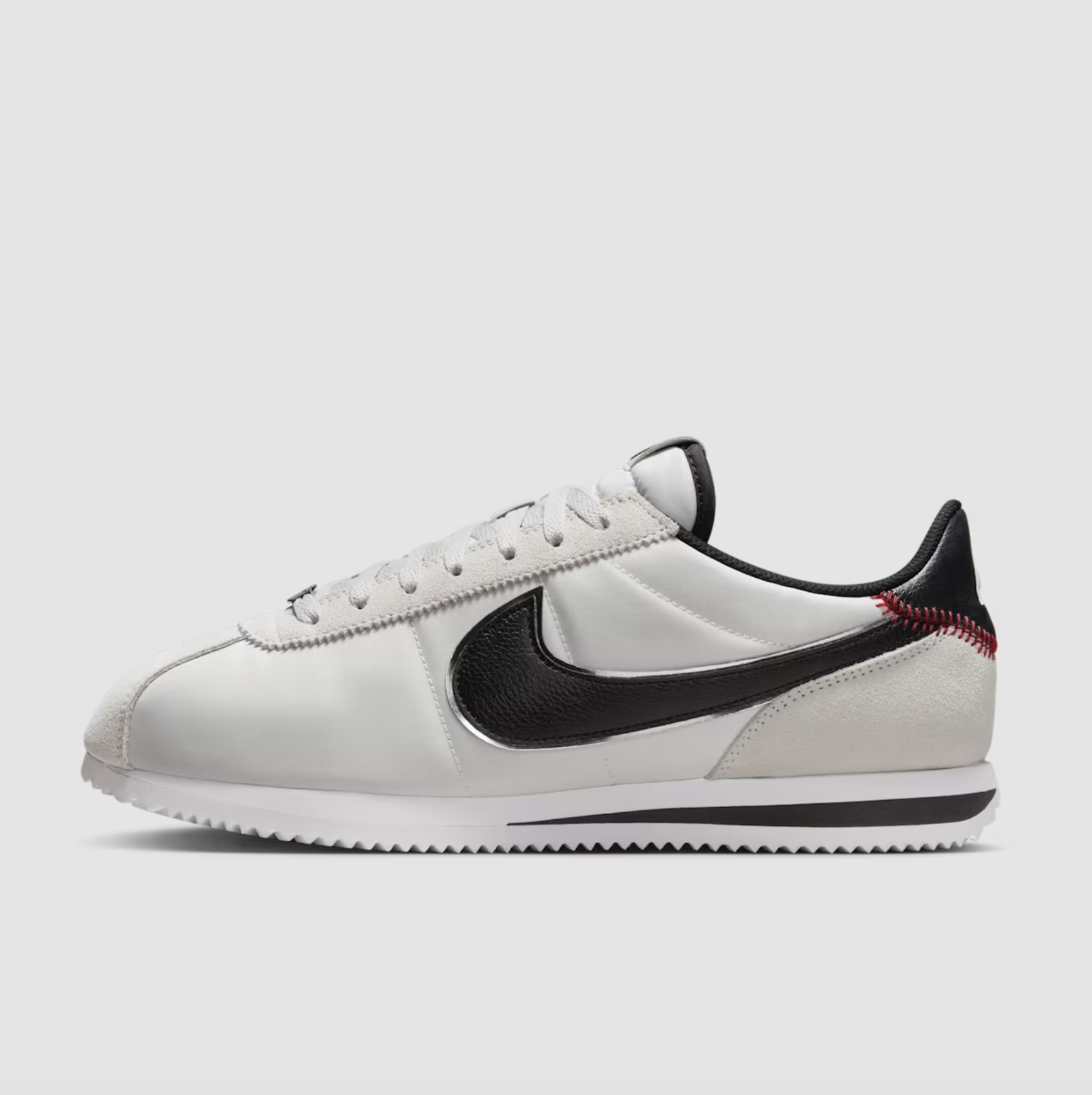 Nike Cortez Jackie Robinson Day Nike Cortez Jackie Robinson Day lateral side showcasing clean white upper and black Swoosh