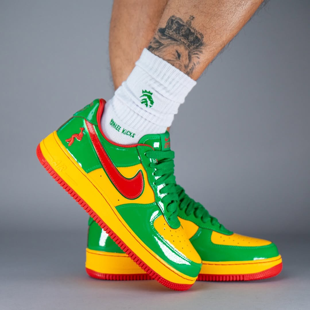Alternate angle of the vibrant red, green, and yellow Nike Air Force 1 “Lucky Green” by Lil Yachty.