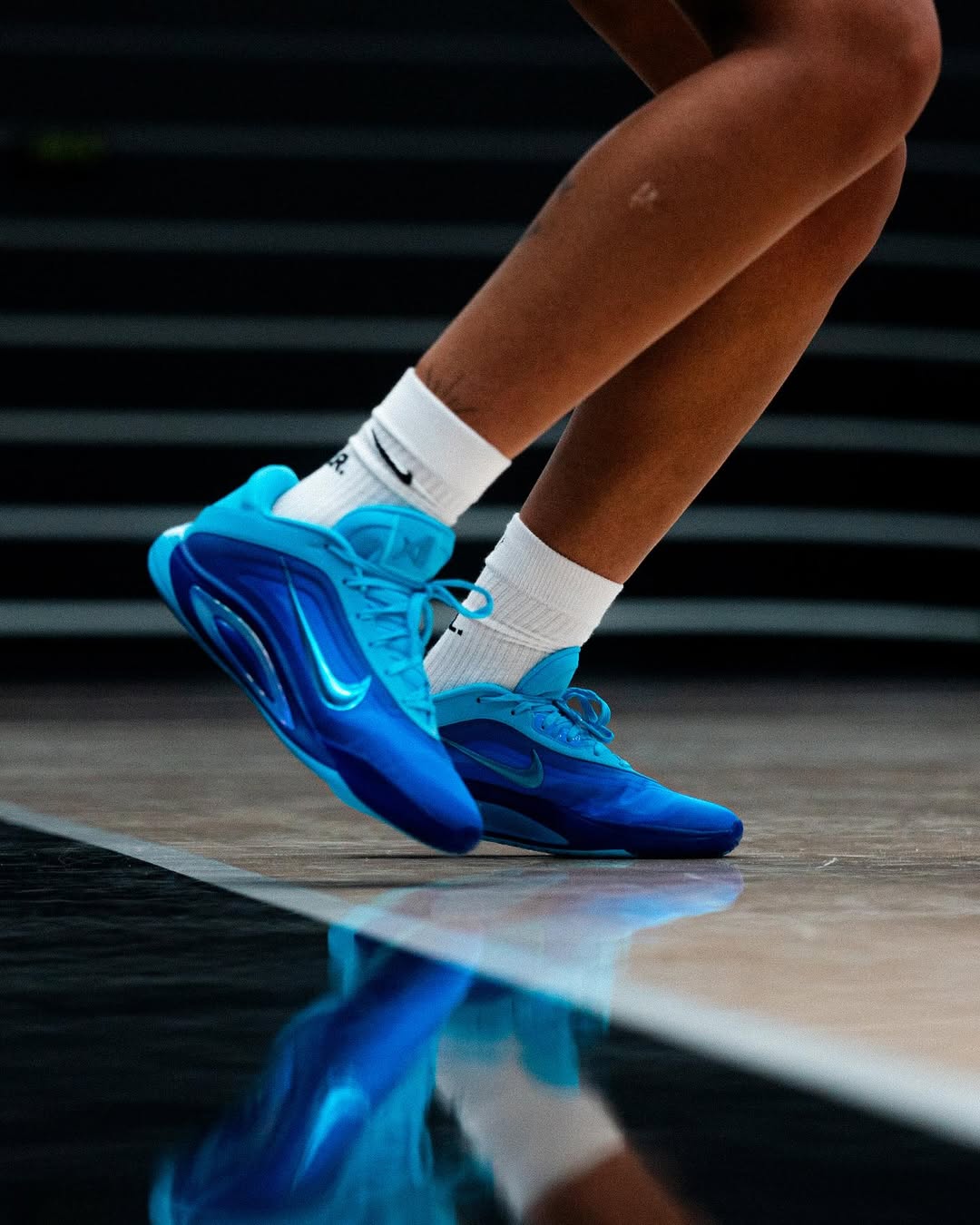 Nike A'One "Blue Fury" (W) official on-feet look on basketball court.