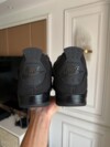 Air Jordan 4 Black Cat in-hand look