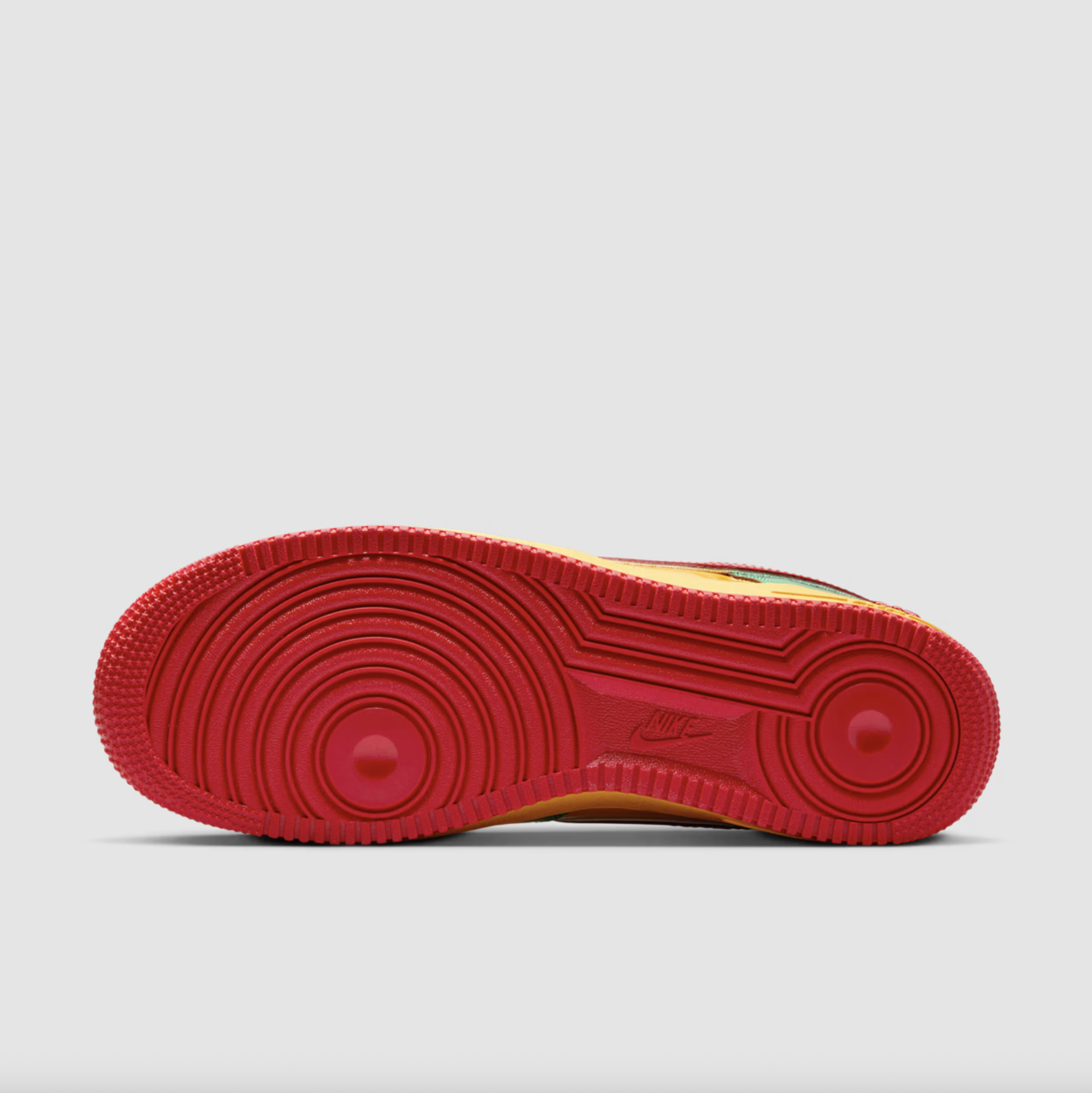 Official images of the vibrant red, green, and yellow Nike Air Force 1 “Lucky Green” by Lil Yachty.