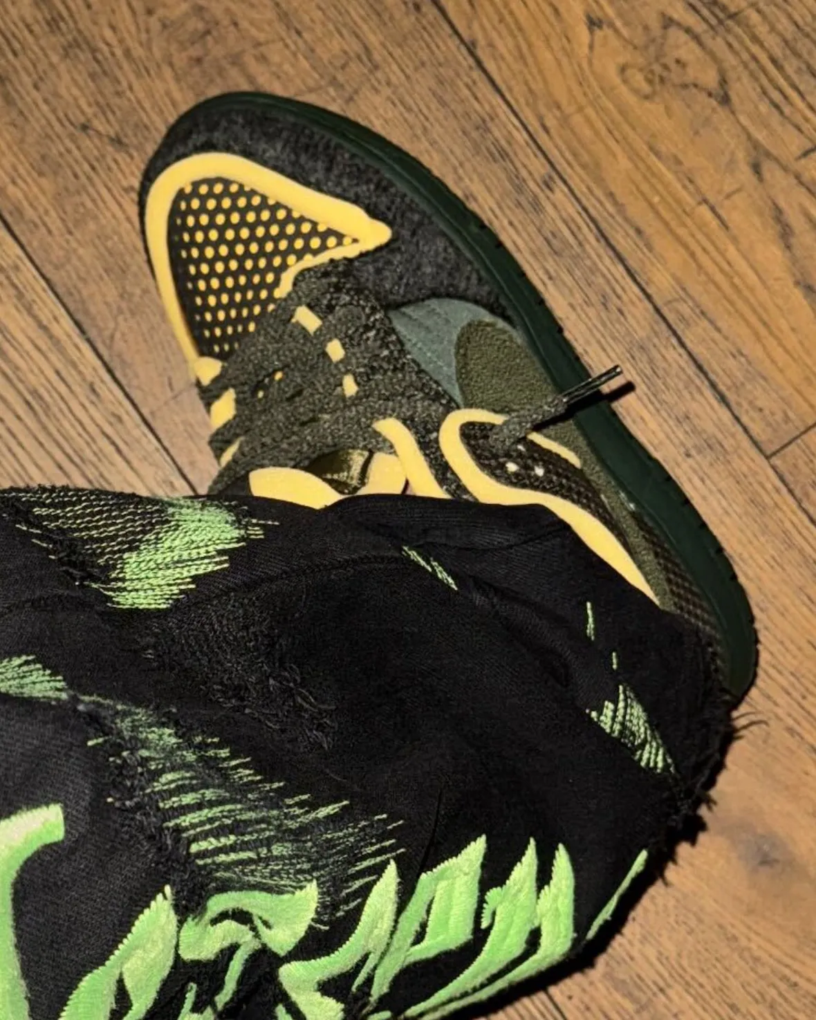 Cactus Plant Flea Market x Nike Dunk Low Swamp Sponge CPFM x Nike Dunk Low Sequoia on-feet shot on wooden floor