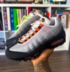 First look at the Nike Air Max 95 “Bright Mandarin” Summer 2025 sneaker featuring orange eyelets and gradient grey upper