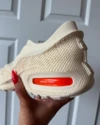 Close-up of the orange Air Max 1000 air cushioning.