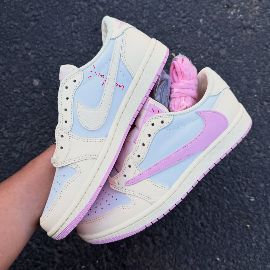 Close-up of the Air Jordan 1 Low OG “Shy Pink” in hand