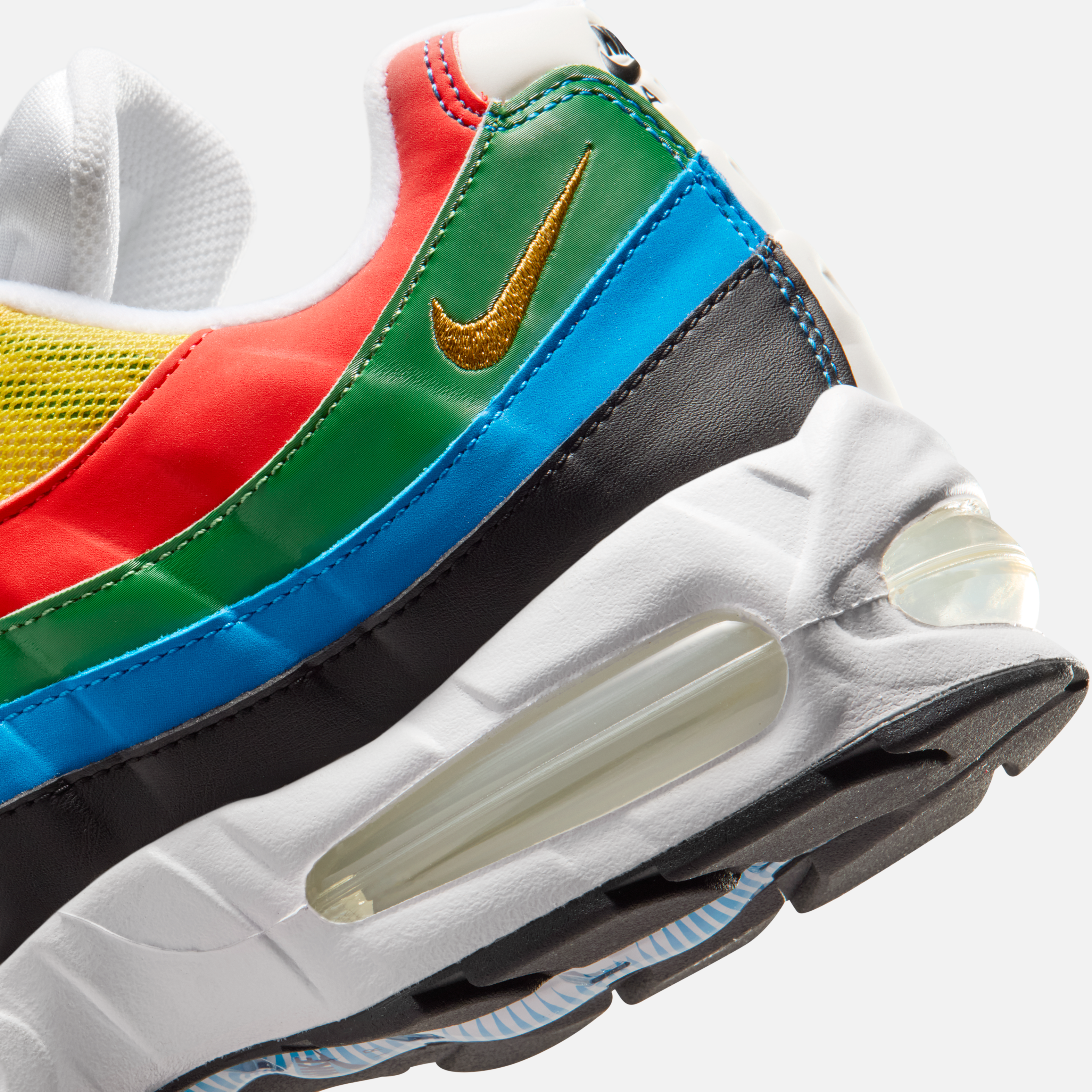 Detailed first look at the 2026 Nike Air Max 95 Olympic returning edition with vibrant red, yellow, green, blue, and black overlays.