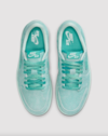 Top view of Air Jordan 1 Low “Washed Teal” W showing tongue and laces