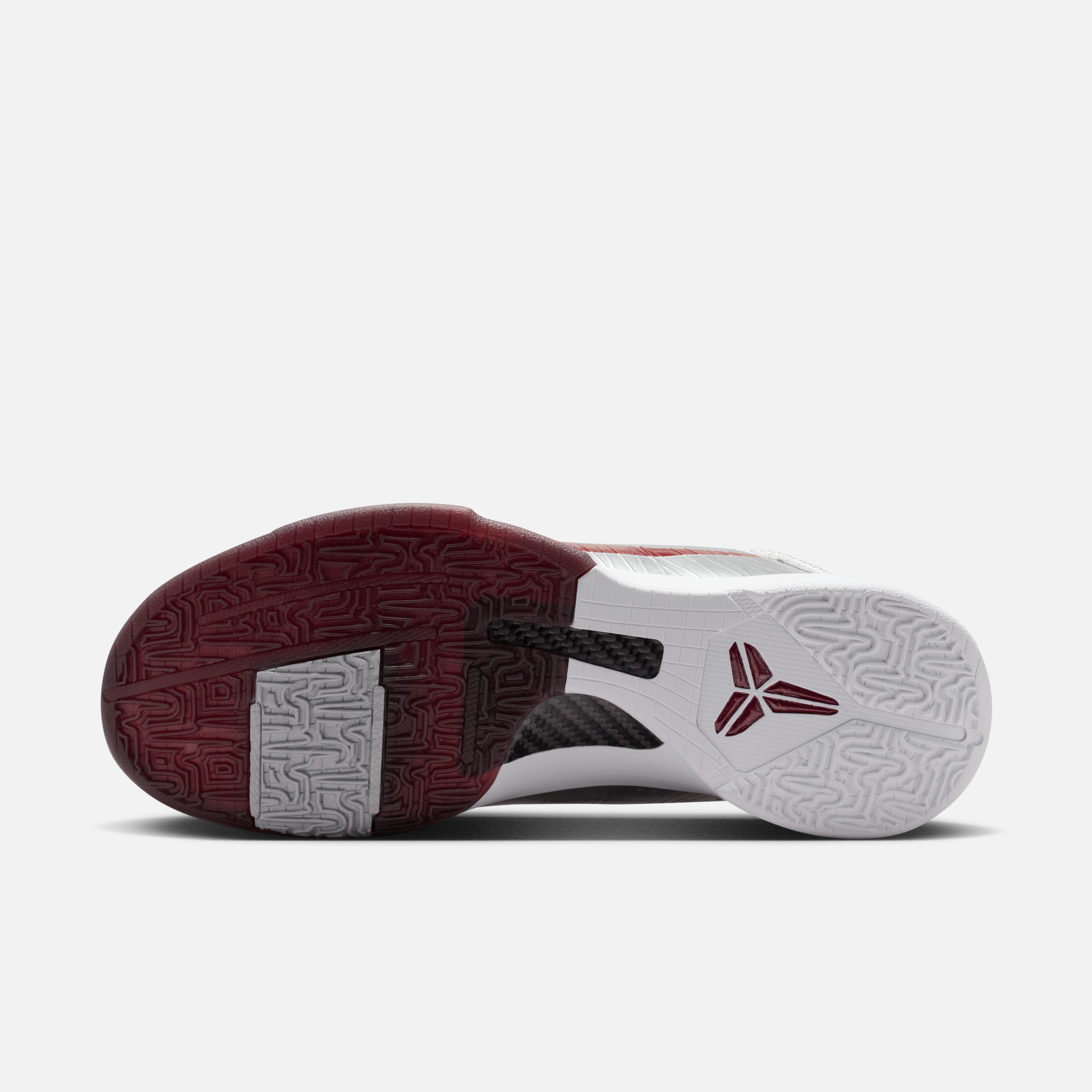 Side view of the Nike Kobe 5 Protro “Lower Merion Away” with silver-red upper and Swoosh
