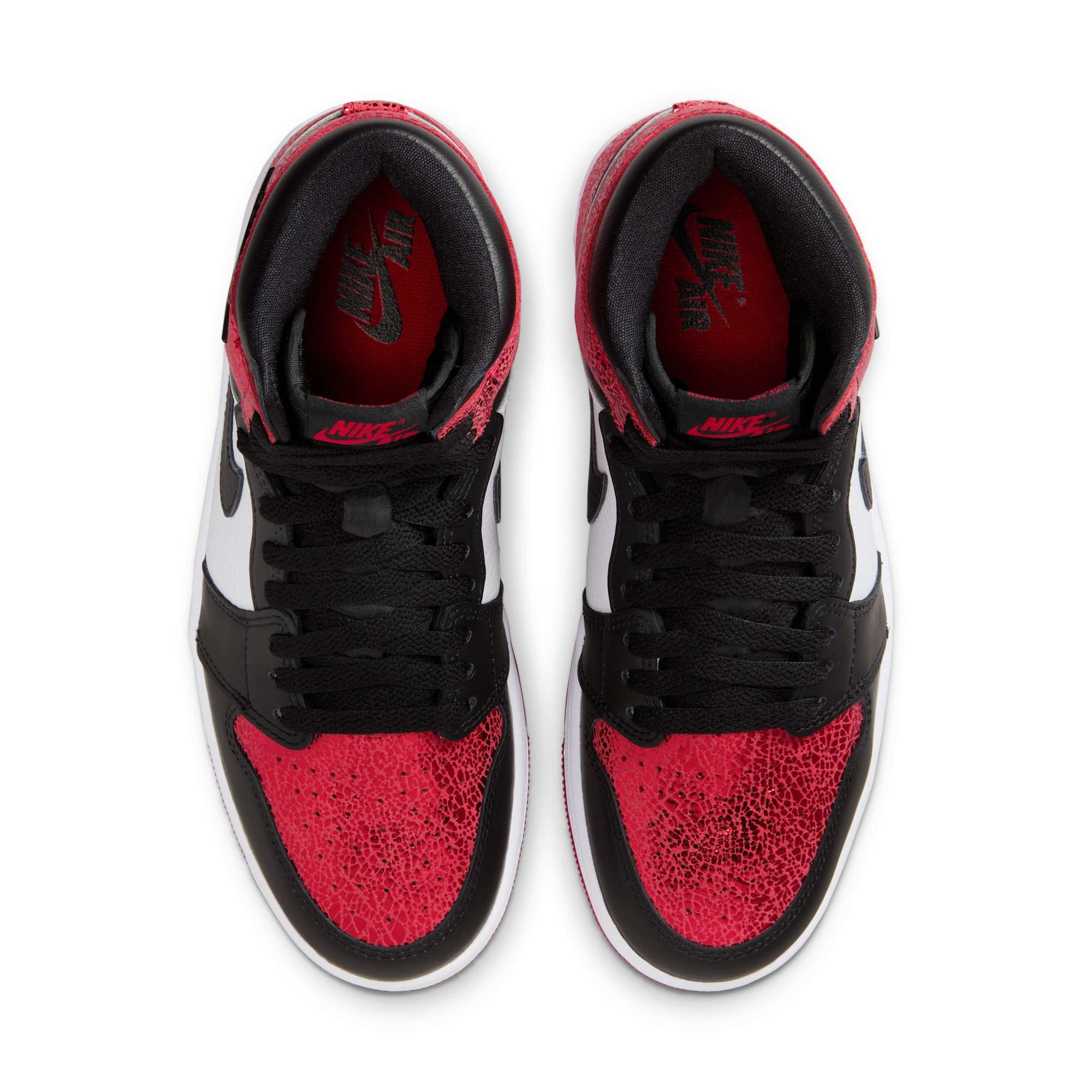 Top view of Air Jordan 1 High Ruby showing cracked leather finish and Nike Air branding