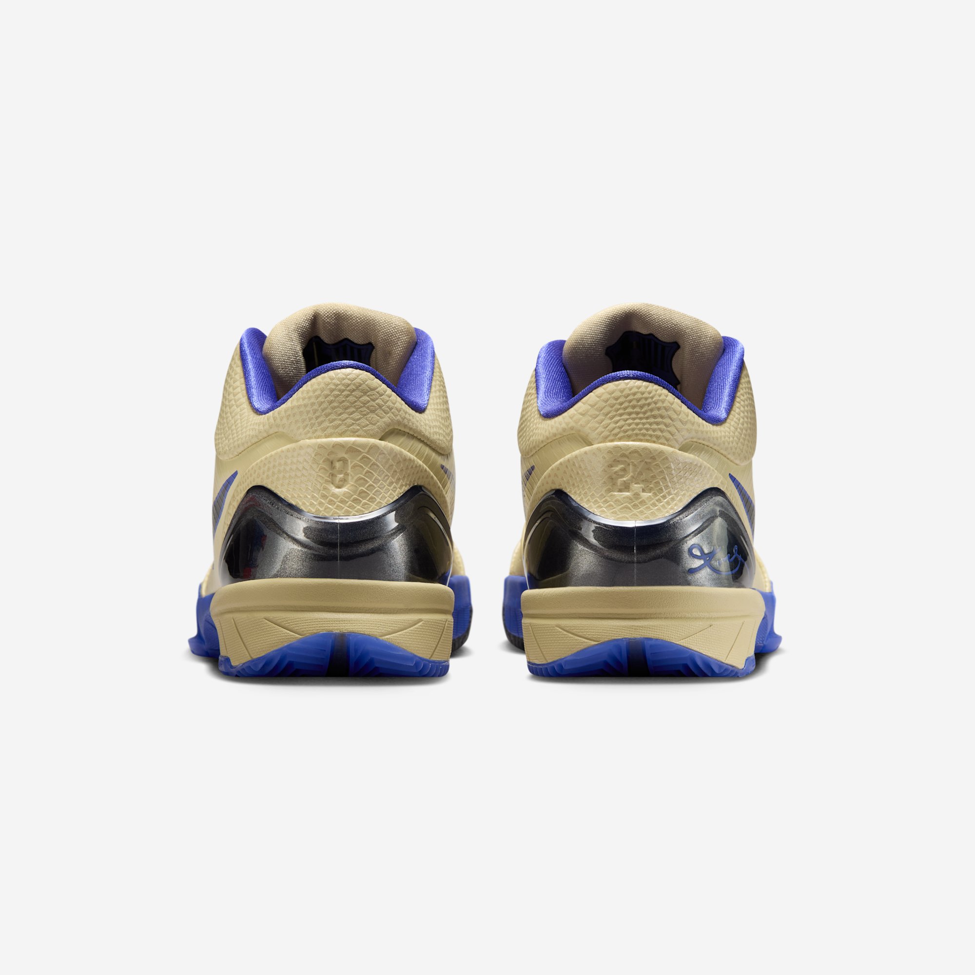 FC Barcelona x Nike Kobe 4 Protro Arts‑Rec x Nike SB Dunk Low in open beige sneaker box with safari print paper