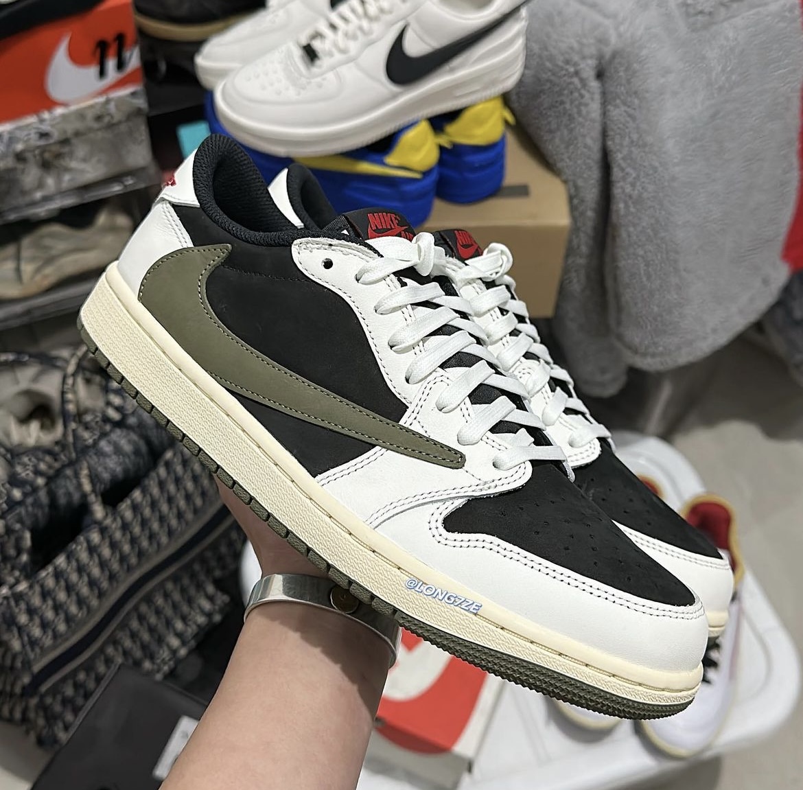 In-Hand Look of the Travis Scott x Air Jordan 1 Low "Olive" (W) 1