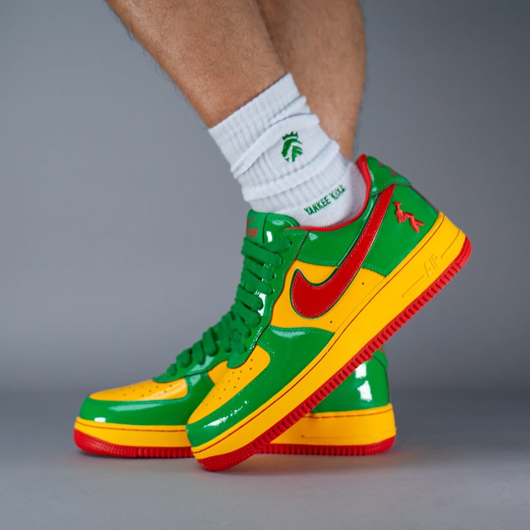 Alternate angle of the vibrant red, green, and yellow Nike Air Force 1 “Lucky Green” by Lil Yachty.