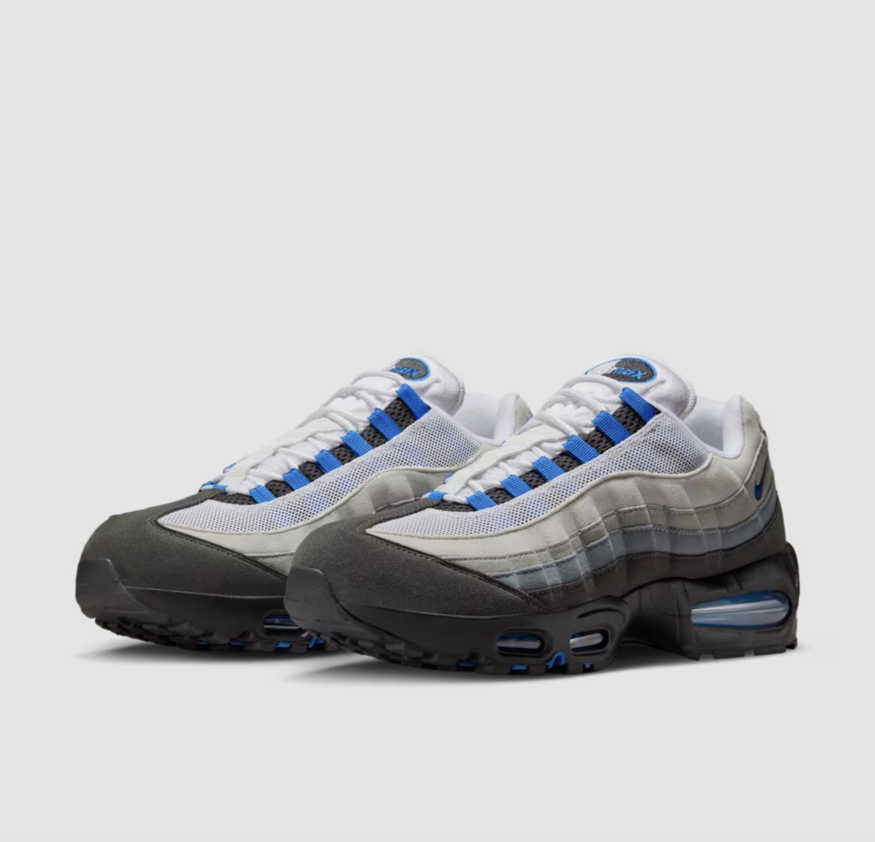 Nike Air Max 95 “Blue Spark” Paaransicht des Nike Air Max 95 „Blue Spark“ vor grauem Hintergrund